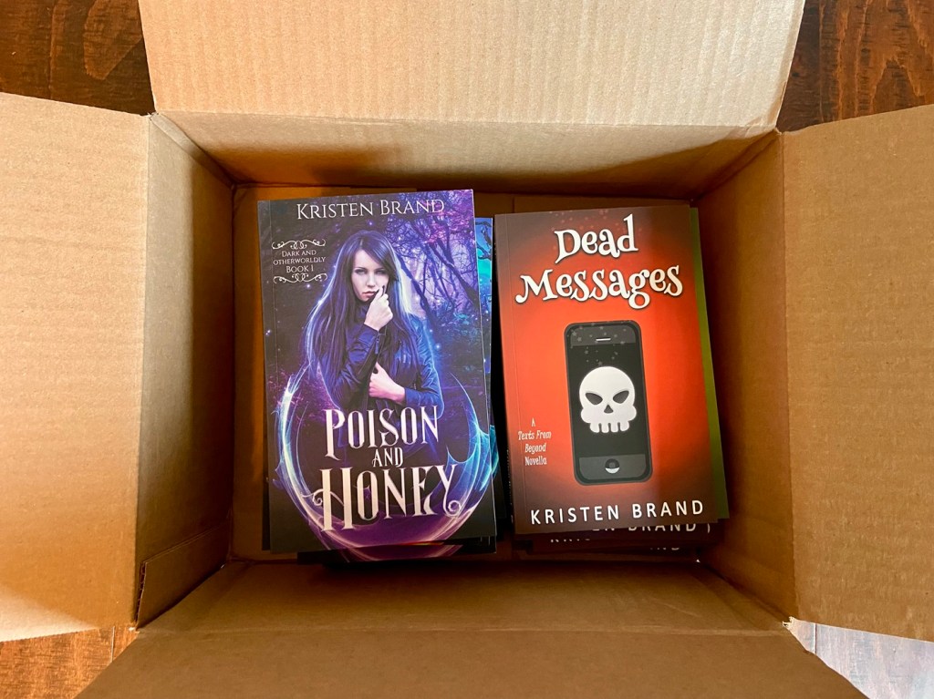 Box of urban fantasy and cozy mystery books